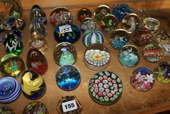 A collection of assorted glass paperweights